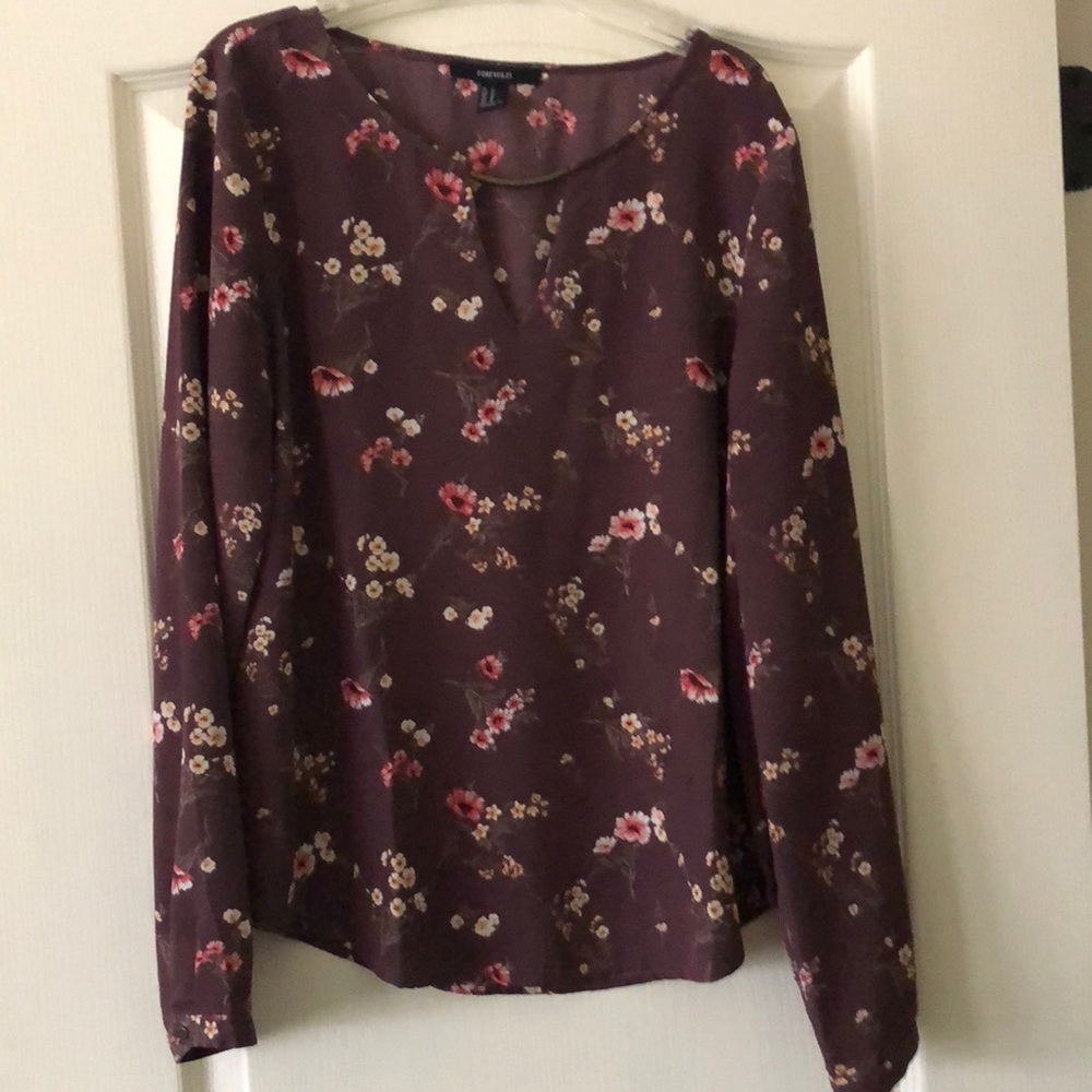 Floral blouse with a cutout